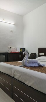 varsha enclave trinity house