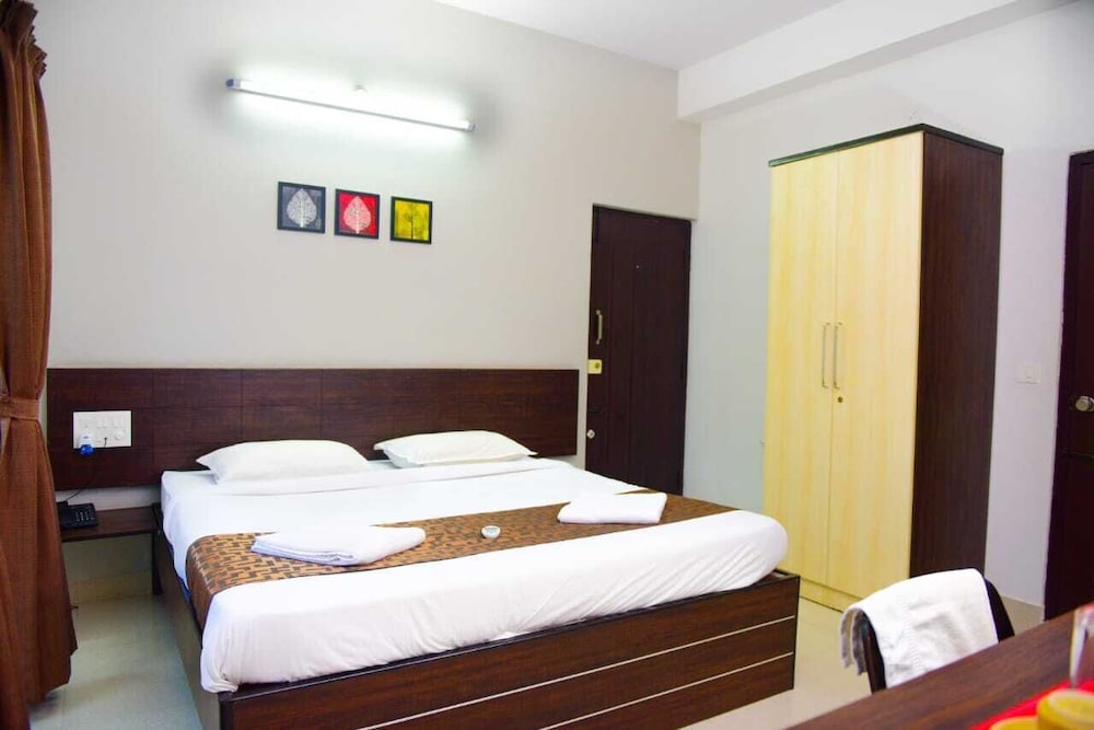 varsha enclave trinity house