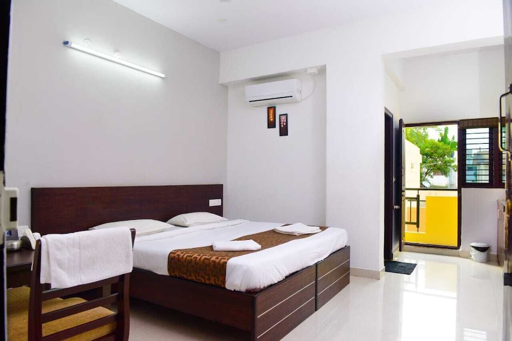 varsha enclave trinity house