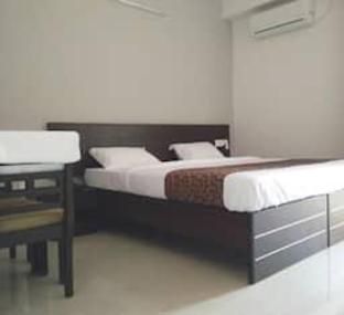 varsha enclave trinity house