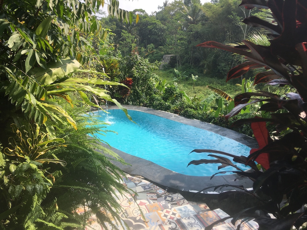 the riverside javanese cottages