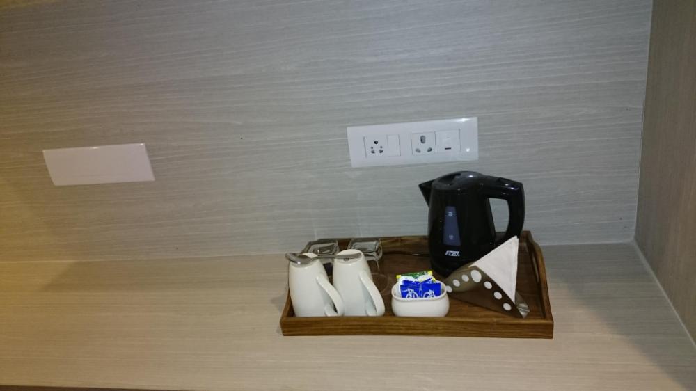 mango hotels naveen davangere