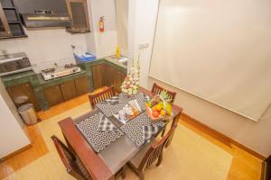 rafflesia serviced apartments