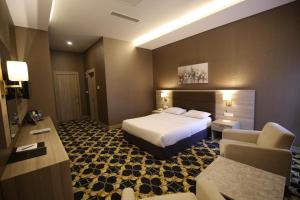 hotel excellence inn