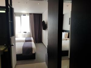 hotel vella suite suwon