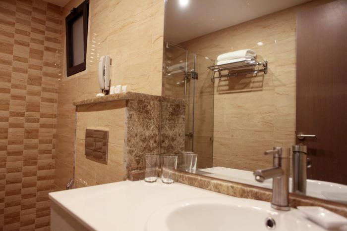 almond hotel apartments