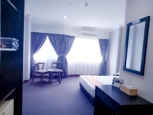 hotel myangkasa akademi and resort