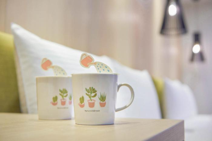 green hotel west district