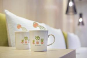 green hotel west district