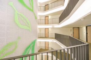 green hotel west district