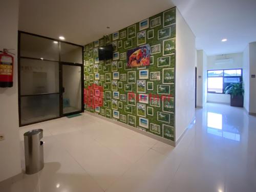 hotel alpha makassar redpartner