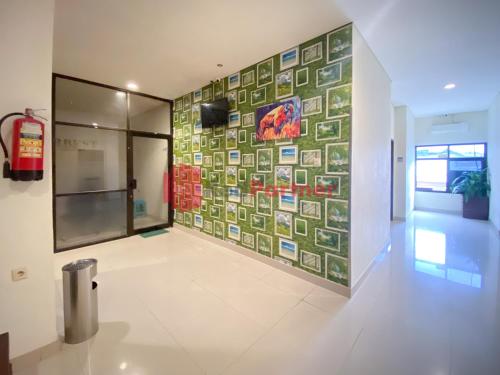 hotel alpha makassar redpartner