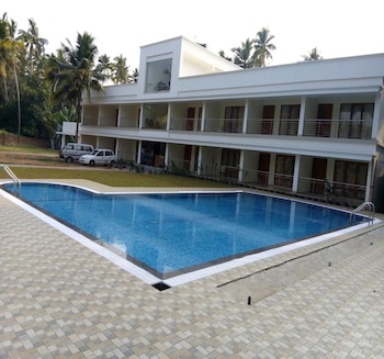 super townhouse oak thiruvallam lakeview formerly travancore island resort