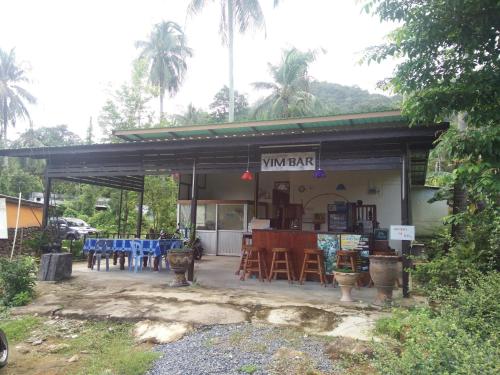 day night bungalow and bar