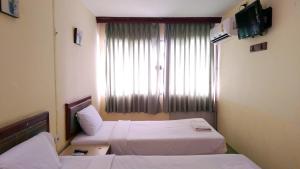 Wattana Trang Hotel,Trang>>Ko Kradan,3 star