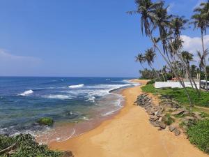 ashens beach house