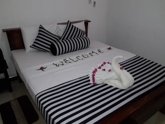 n l i guest house