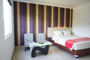 mels inn manado