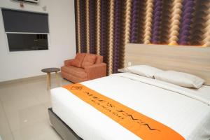 mels inn manado