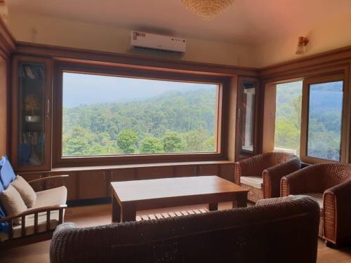 Tropical Blooms,Virajpet,3 star