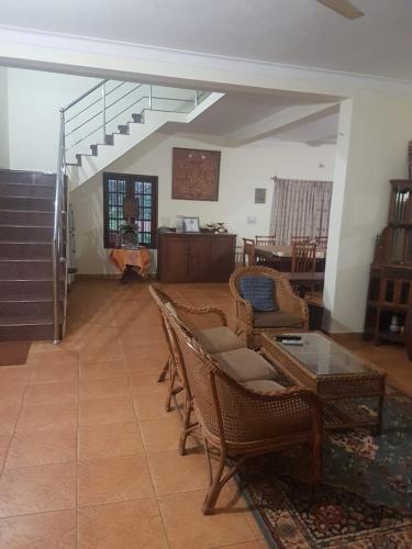 Tropical Blooms,Virajpet,3 star