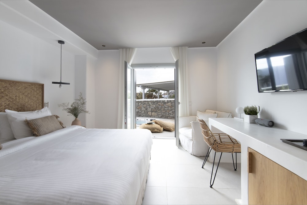 adorno beach hotel and suites