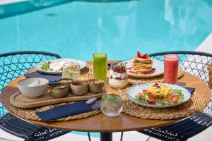 adorno beach hotel and suites