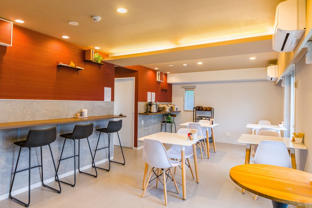 mr kinjo in asahibashi station square