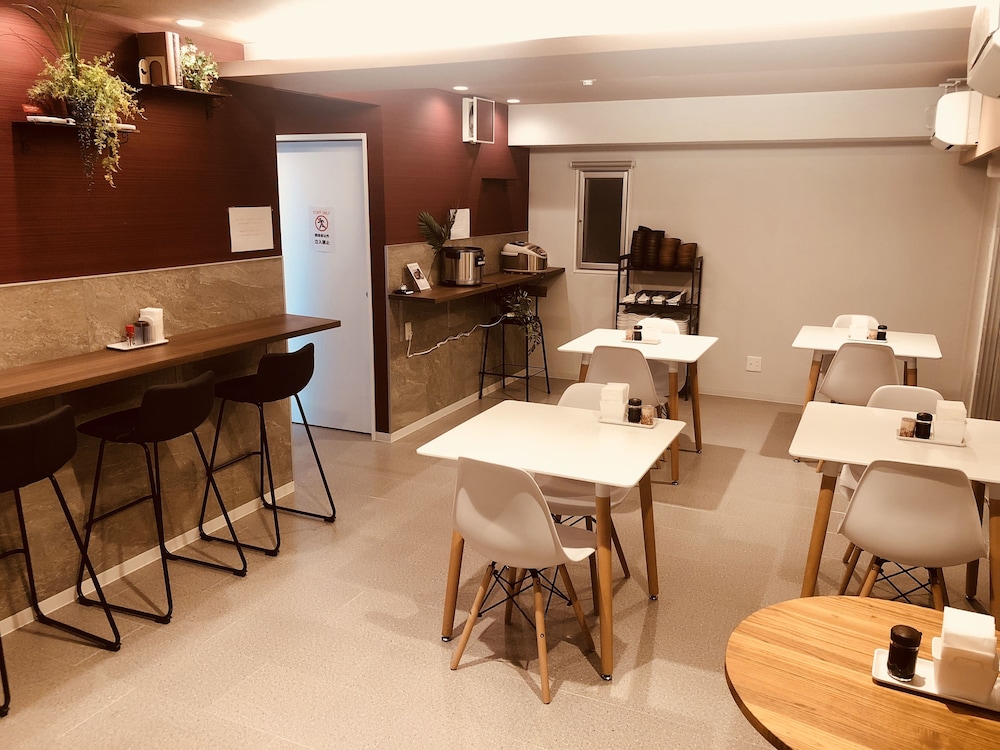 mr kinjo in asahibashi station square