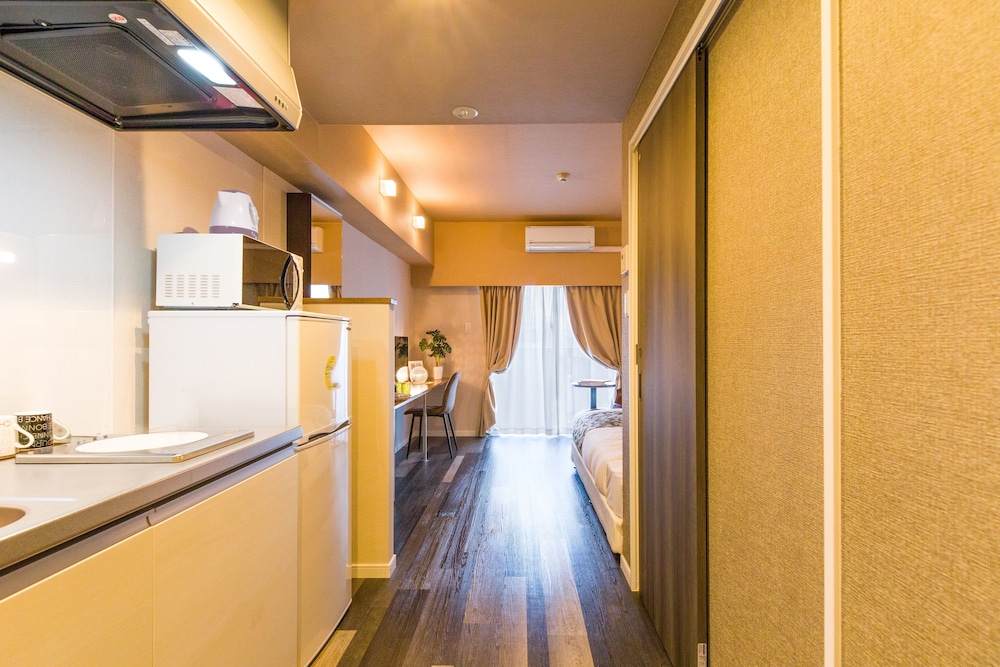 mr kinjo in asahibashi station square