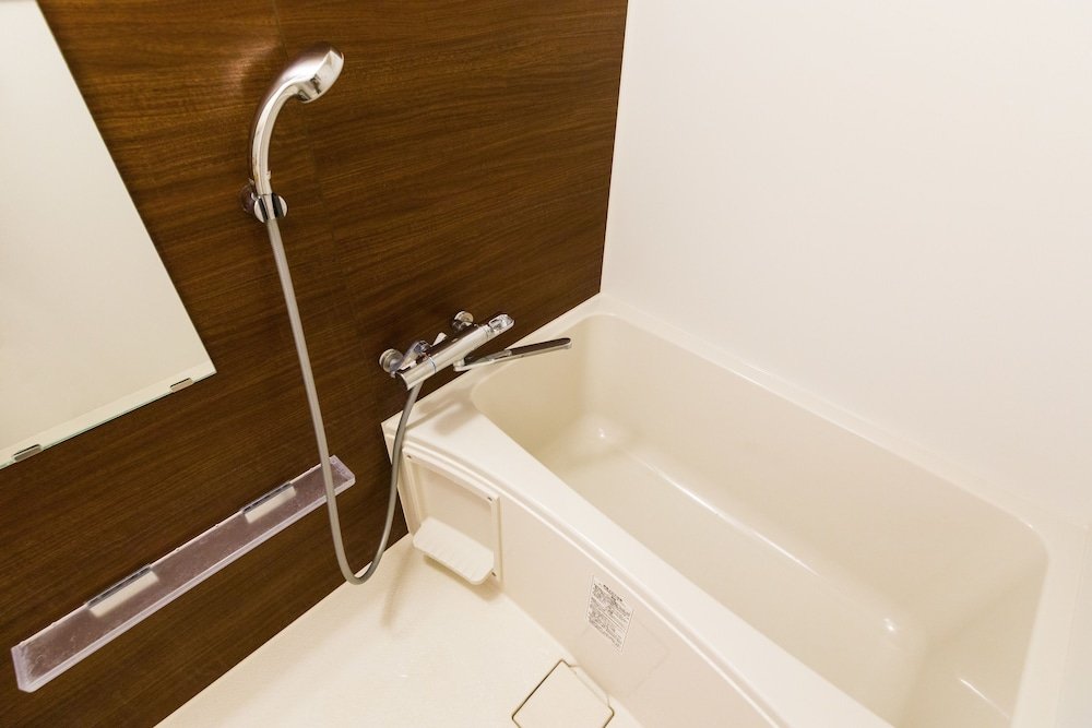 mr kinjo in asahibashi station square