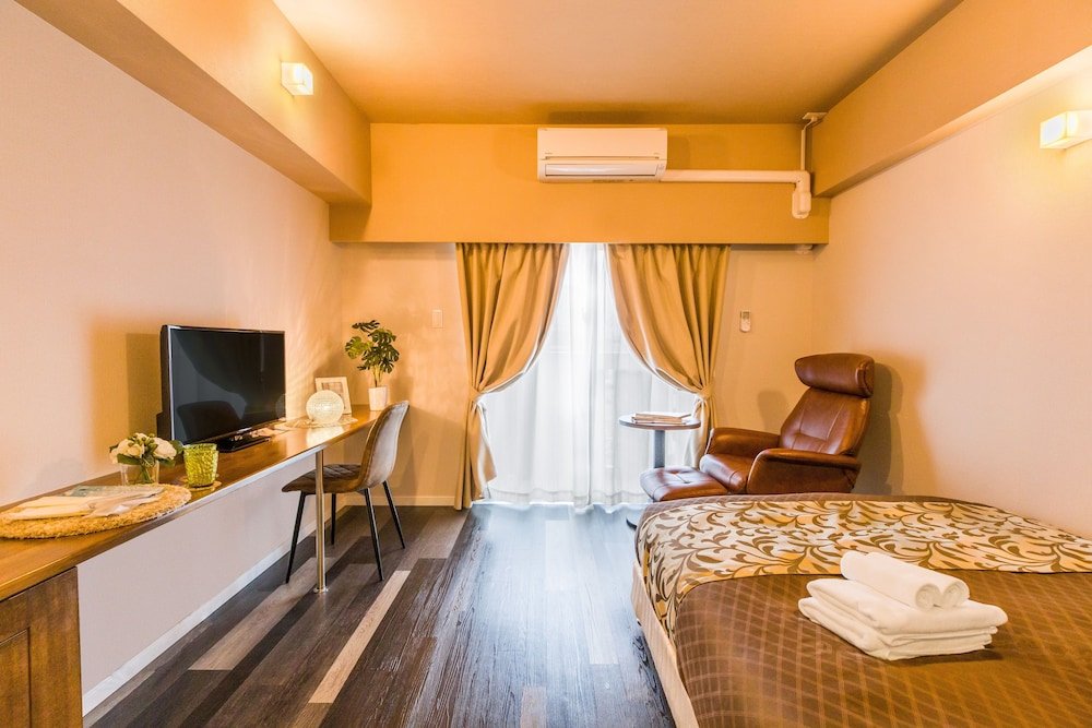 mr kinjo in asahibashi station square