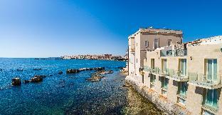 re dionisio luxury suites