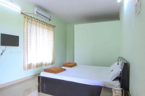 Nisarg Guest House,,2 star