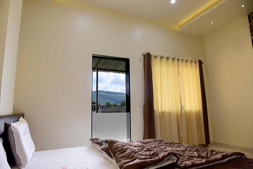 hotel pushpak satara