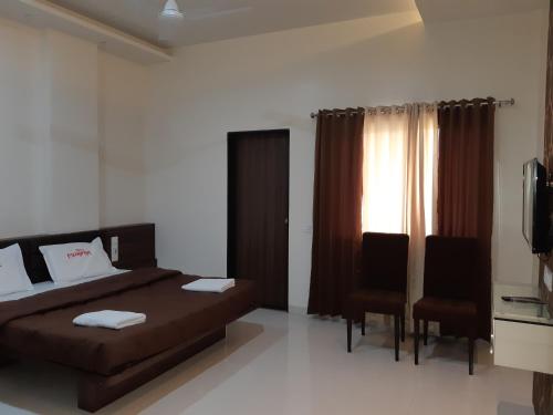 hotel pushpak satara