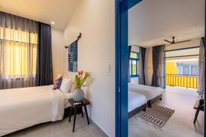 chez mimosa hoi an blue villa