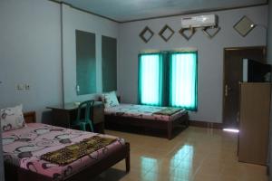 penginapan artha