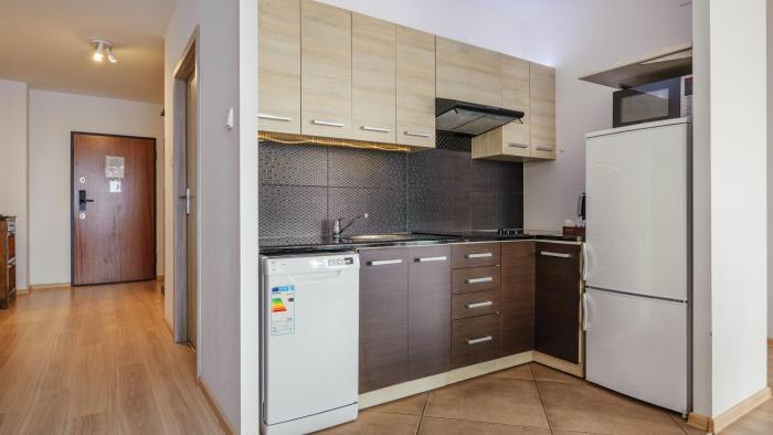 aura gdansk by sun and snow