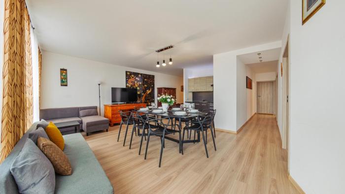 aura gdansk by sun and snow