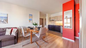 aura gdansk by sun and snow