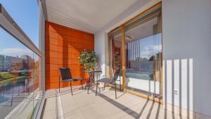 aura gdansk by sun and snow