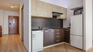 aura gdansk by sun and snow