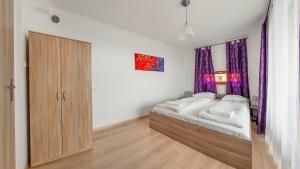 aura gdansk by sun and snow