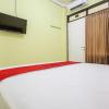reddoorz near petra university 2