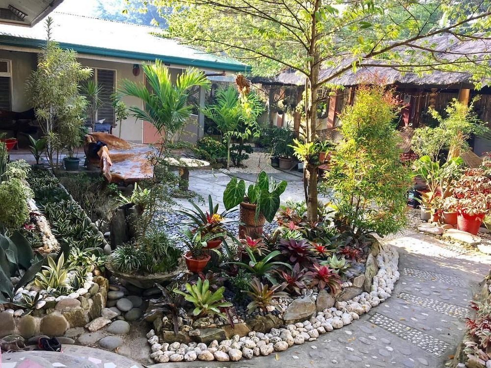 pisces garden tourist inn