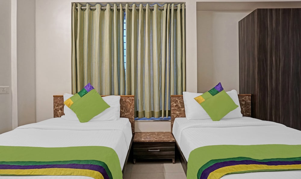 treebo diamond residency ddpk inn