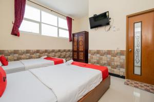 reddoorz syariah near batu night spectacular