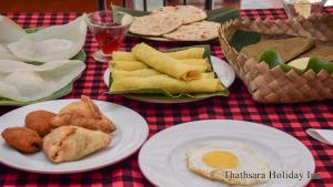 thathsara holiday inn