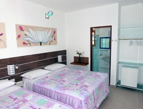 velinn pousada iguana azul